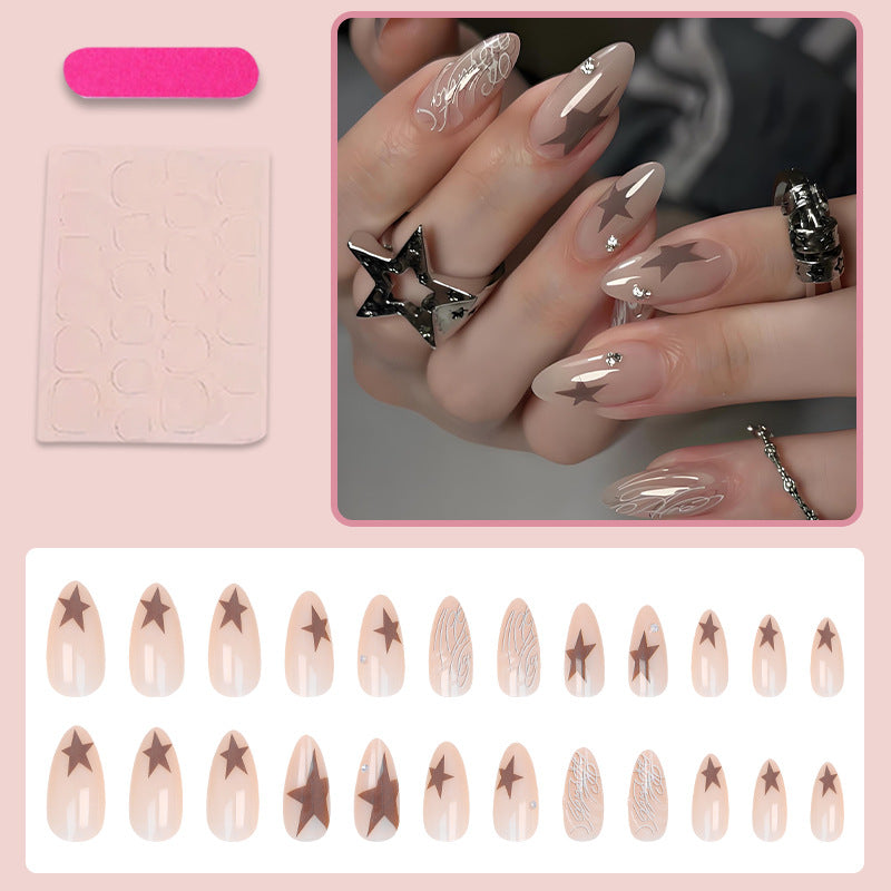 Artificial nail set with elegant star motifs and glitter accents Stornfield