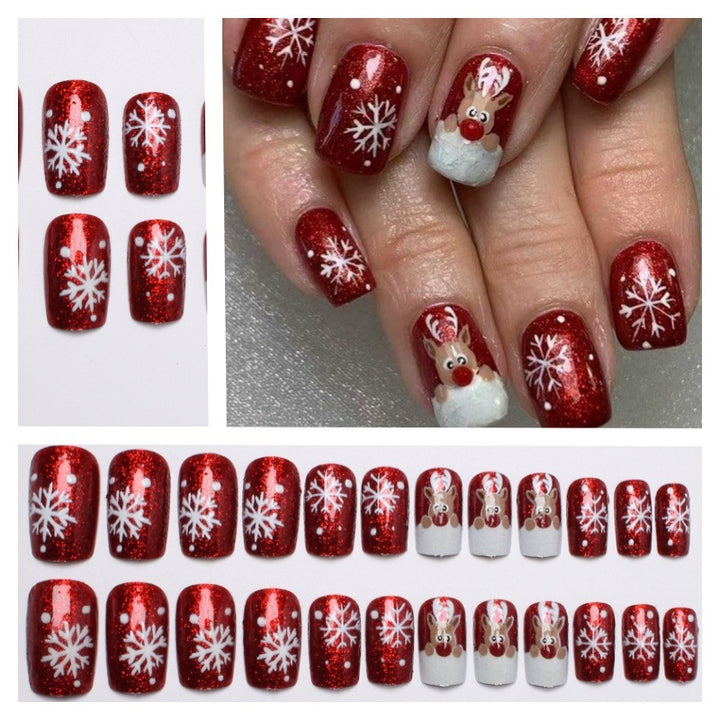 Creative artificial nails with festive reindeer design Stornfield