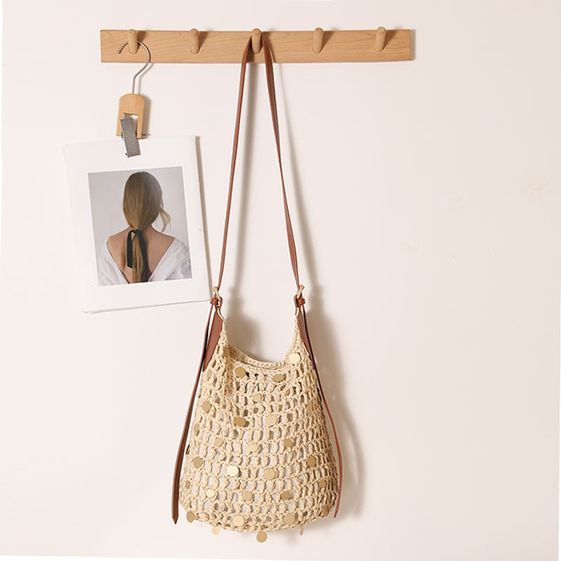 Hand-knotted shoulder bag with metal appliqués Stornfield