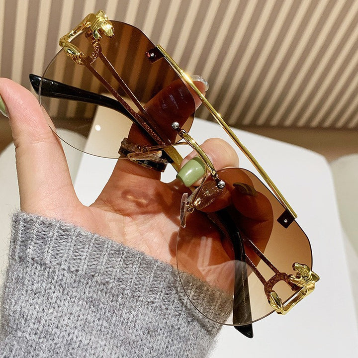 Women Designer Sunglasses with Unique Animal Accent Stornfield