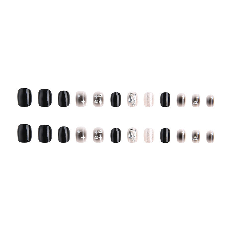 Artificial nail set with glamorous glitter and crystal decorations Stornfield