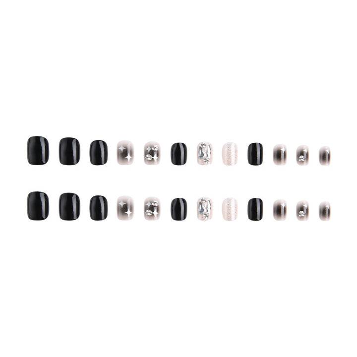 Artificial nail set with glamorous glitter and crystal decorations Stornfield