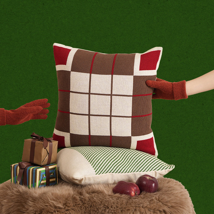 decorative knitted pillow with geometric check pattern