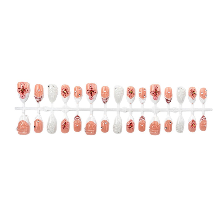 Artificial nails with handcrafted flower and glitter elements Stornfield