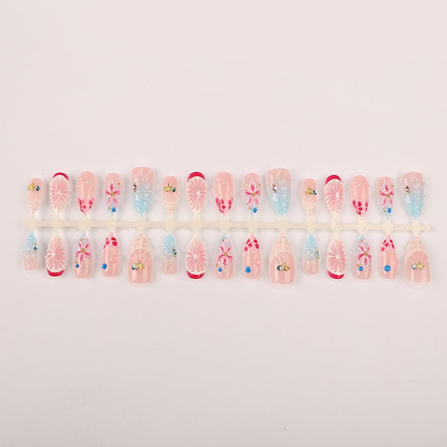 Nail art set with maritime motifs and luxurious glitter accents Stornfield