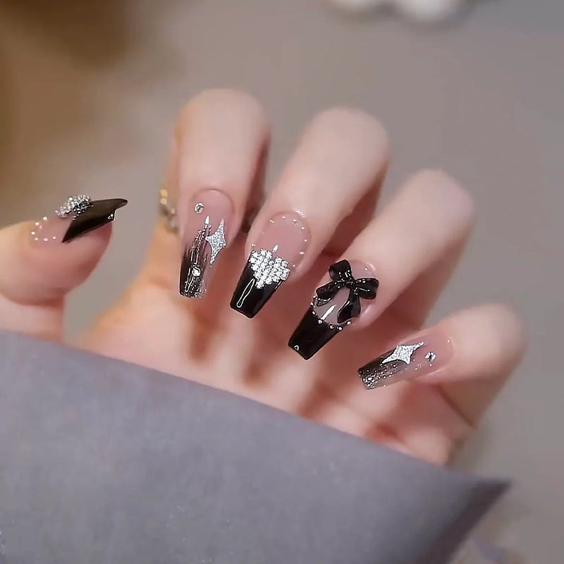 Acrylic nail set with glamorous 3D decorations and noble accents Stornfield