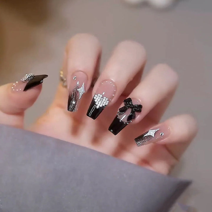 Acrylic nail set with glamorous 3D decorations and noble accents Stornfield