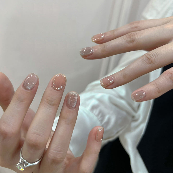 Artistic Press-On Nail Set with Glittery Star Accents Stornfield