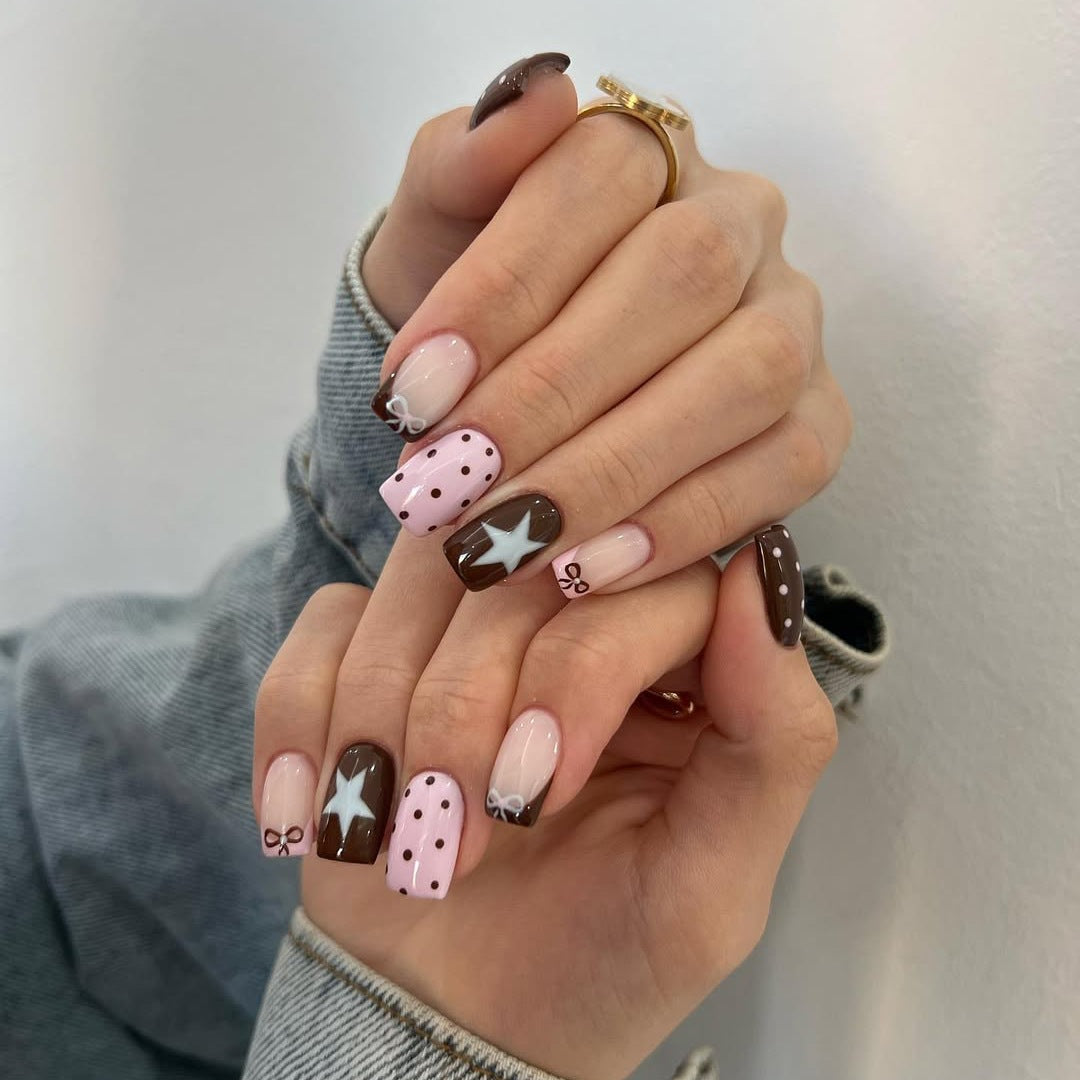 Artificial nail set with playful motifs and high-quality decorations Stornfield