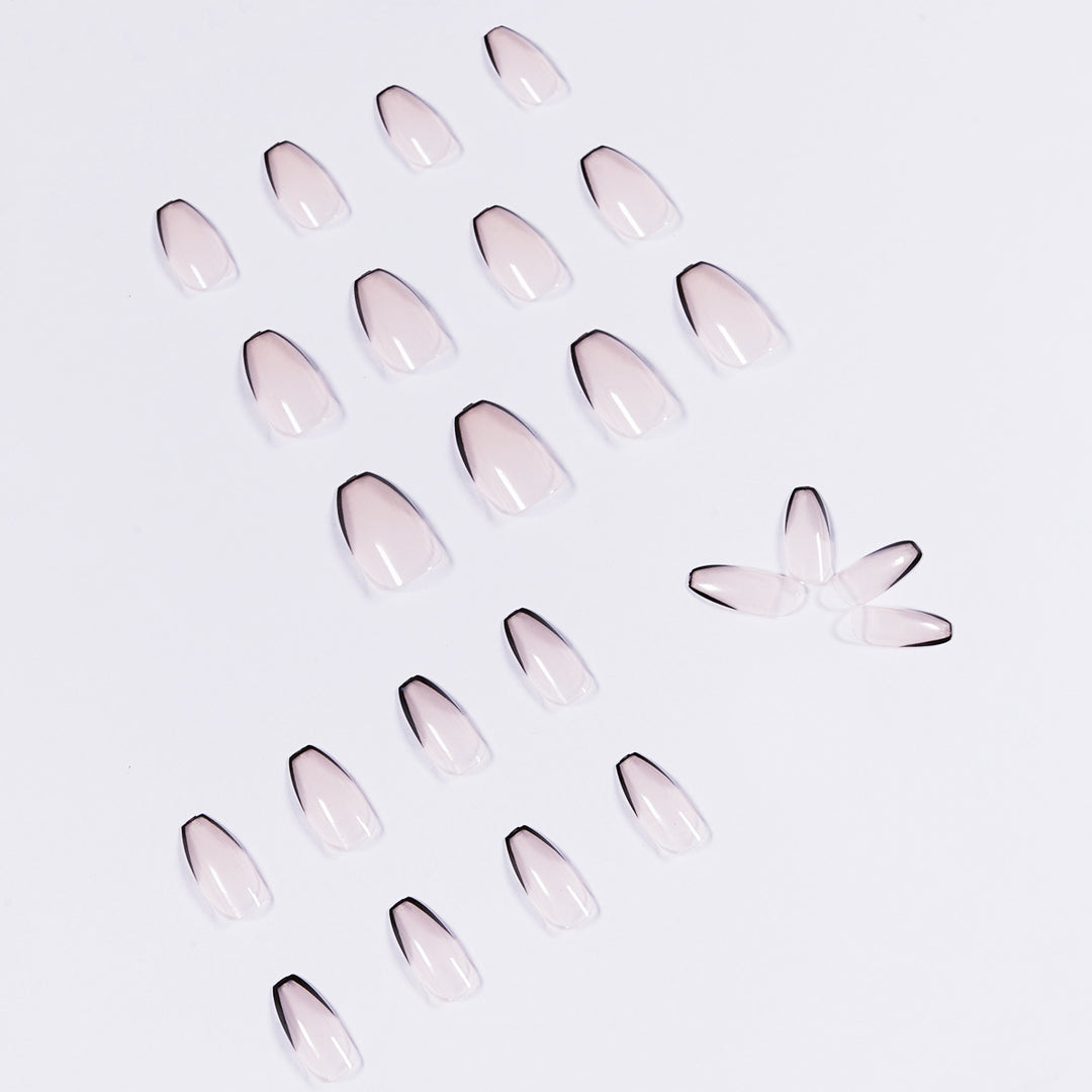 Artful stiletto nails with elegant black tip decoration Stornfield
