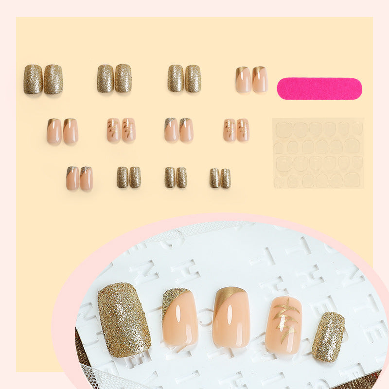 Artificial nail set with elegant gold accents Stornfield