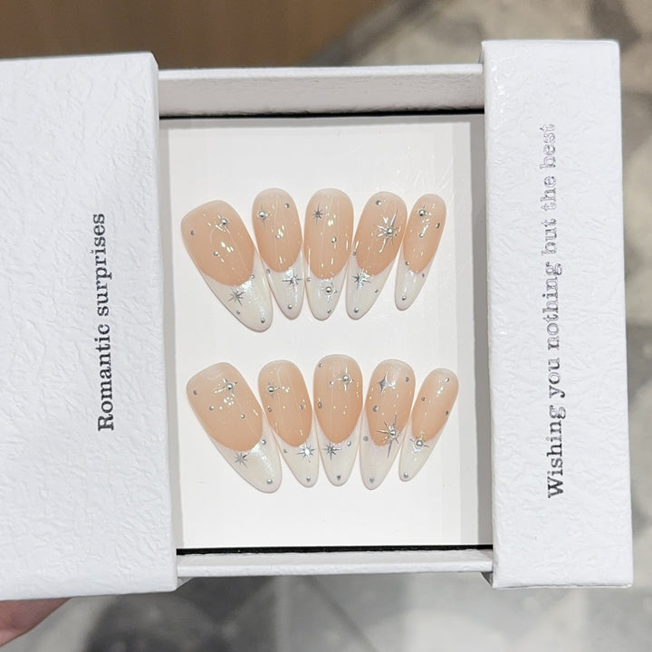 Glamorous artificial nails with romantic star pattern Stornfield