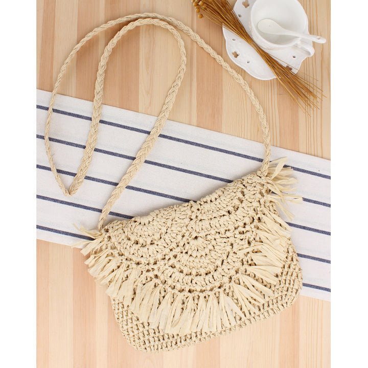 Handcrafted macrame shoulder bag with fringed design Stornfield