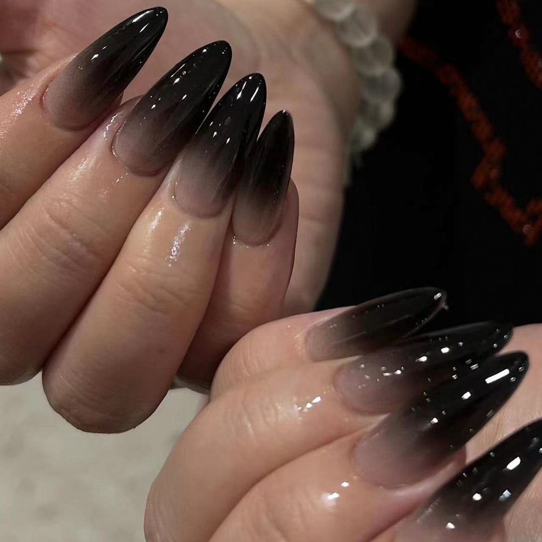 Creative Stiletto Nail Art with Blood Red Accents Stornfield