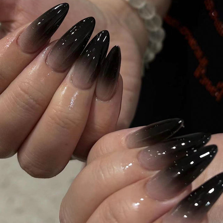 Creative Stiletto Nail Art with Blood Red Accents Stornfield