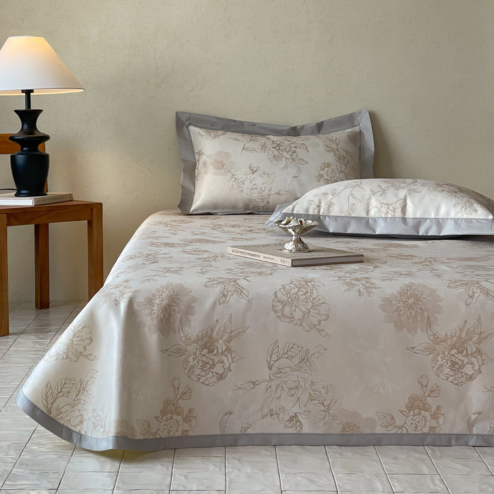 Luxurious satin bed linen set with floral jacquard weaving and wide satin border