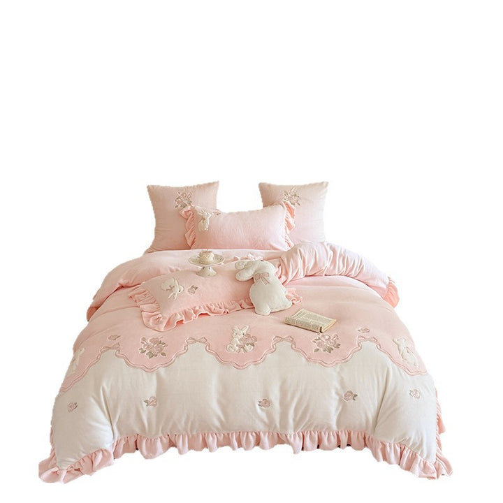 Luxurious bedding set with ruffles and floral embroidery