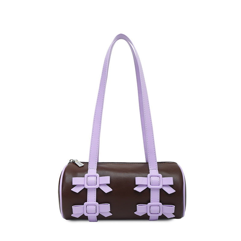 Bow-Accent Barrel Bag