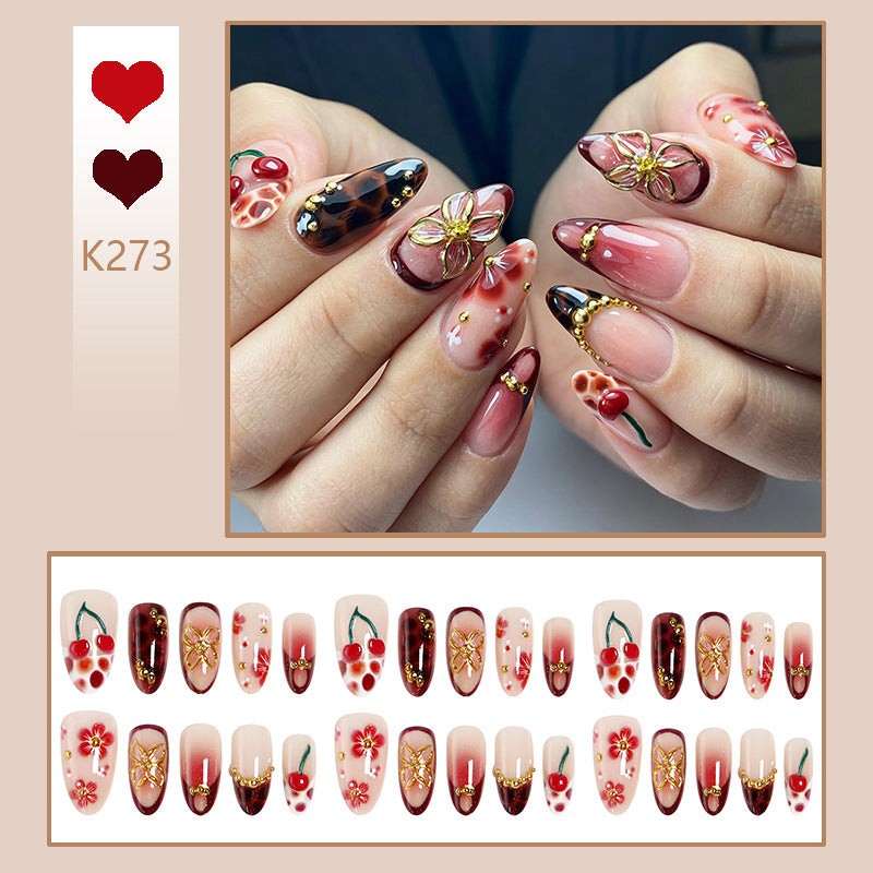 Artful nail tips with cheerful flower and cherry design Stornfield