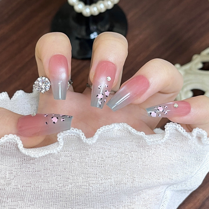 Artistic Nail Design with Elegant Floral Accents Stornfield