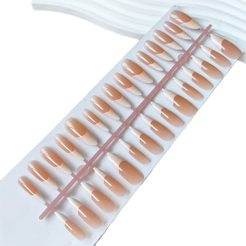 Artificial nails in the elegant French tip design Stornfield