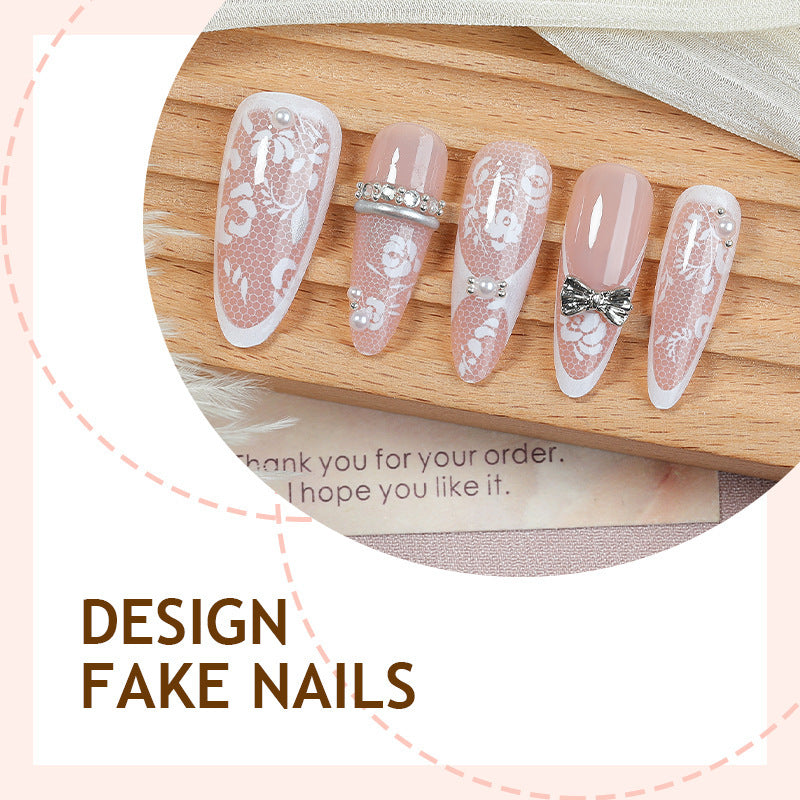 Artificial nail set with romantic floral design and sparkling accents Stornfield