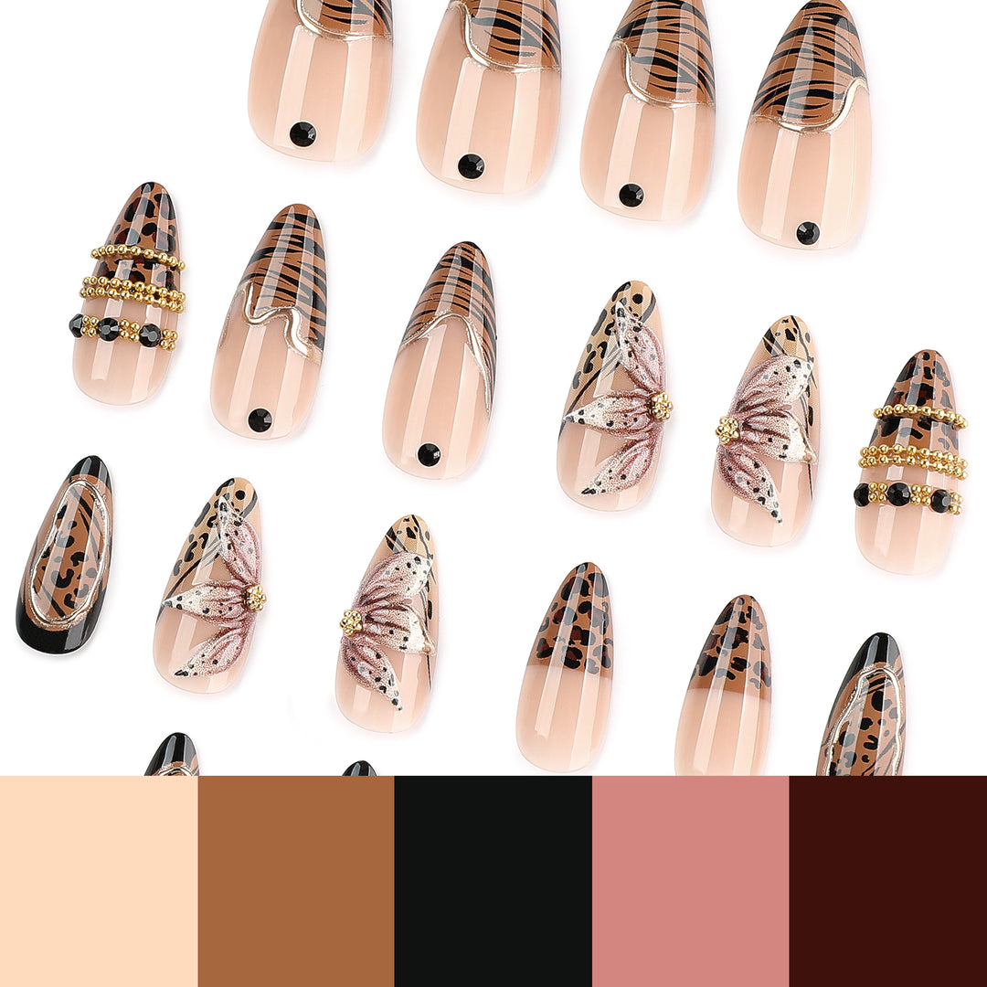Artful stiletto nail with floral accents and gold embellishments Stornfield