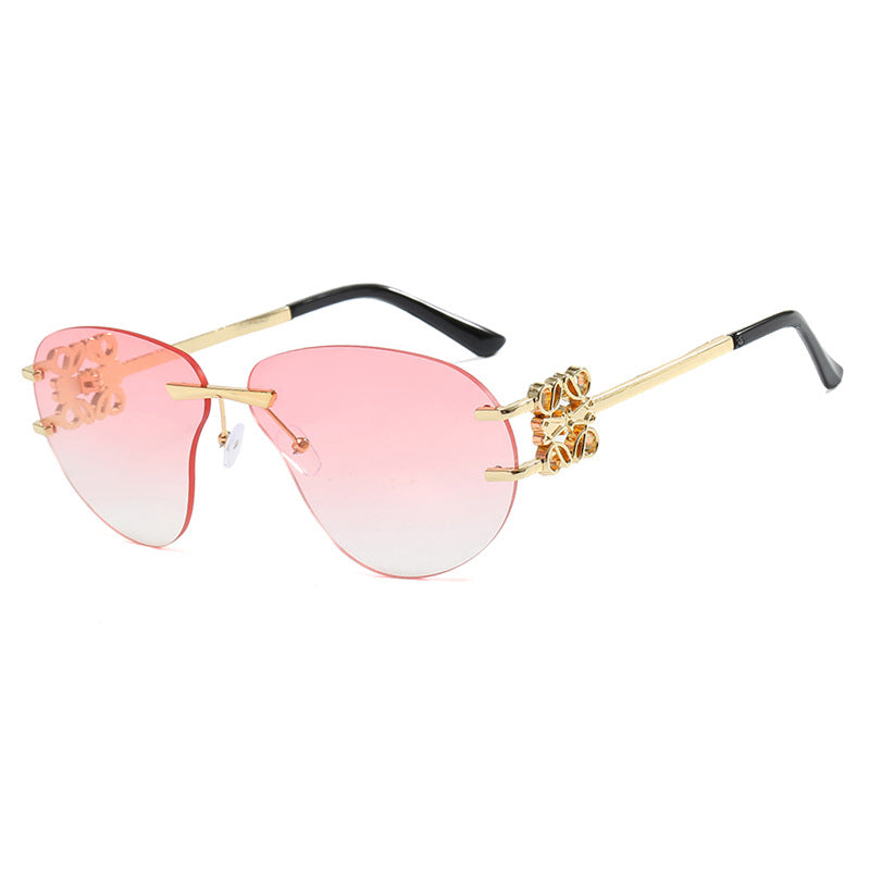 Women's fashionable sunglasses in elegant aviator style with gemstone details Stornfield