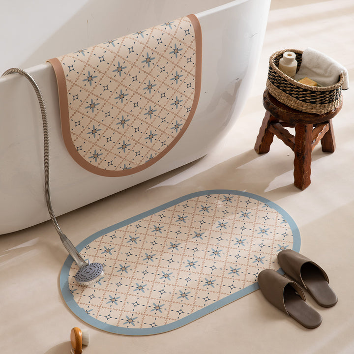 Oval wipeable placemat with embossed tulip pattern and non-slip underside Stornfield