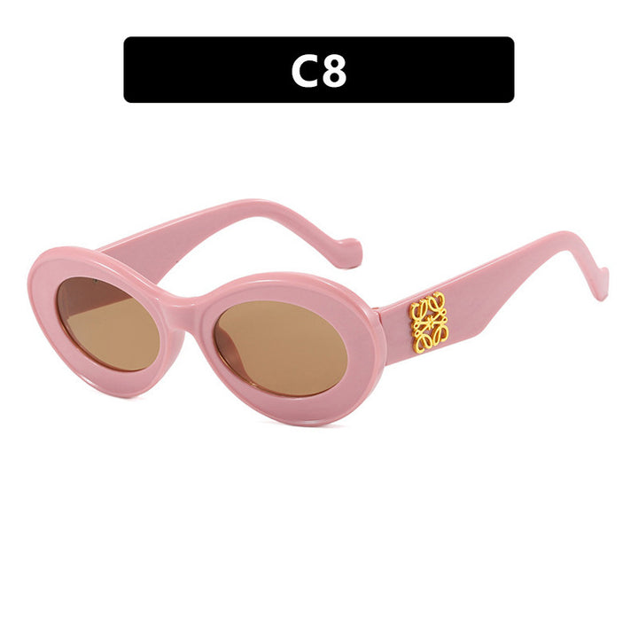 Women's fashionable sunglasses with oval frame and golden accents Stornfield