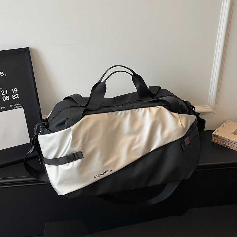 Women's sporty travel bag with innovative compartment system Stornfield