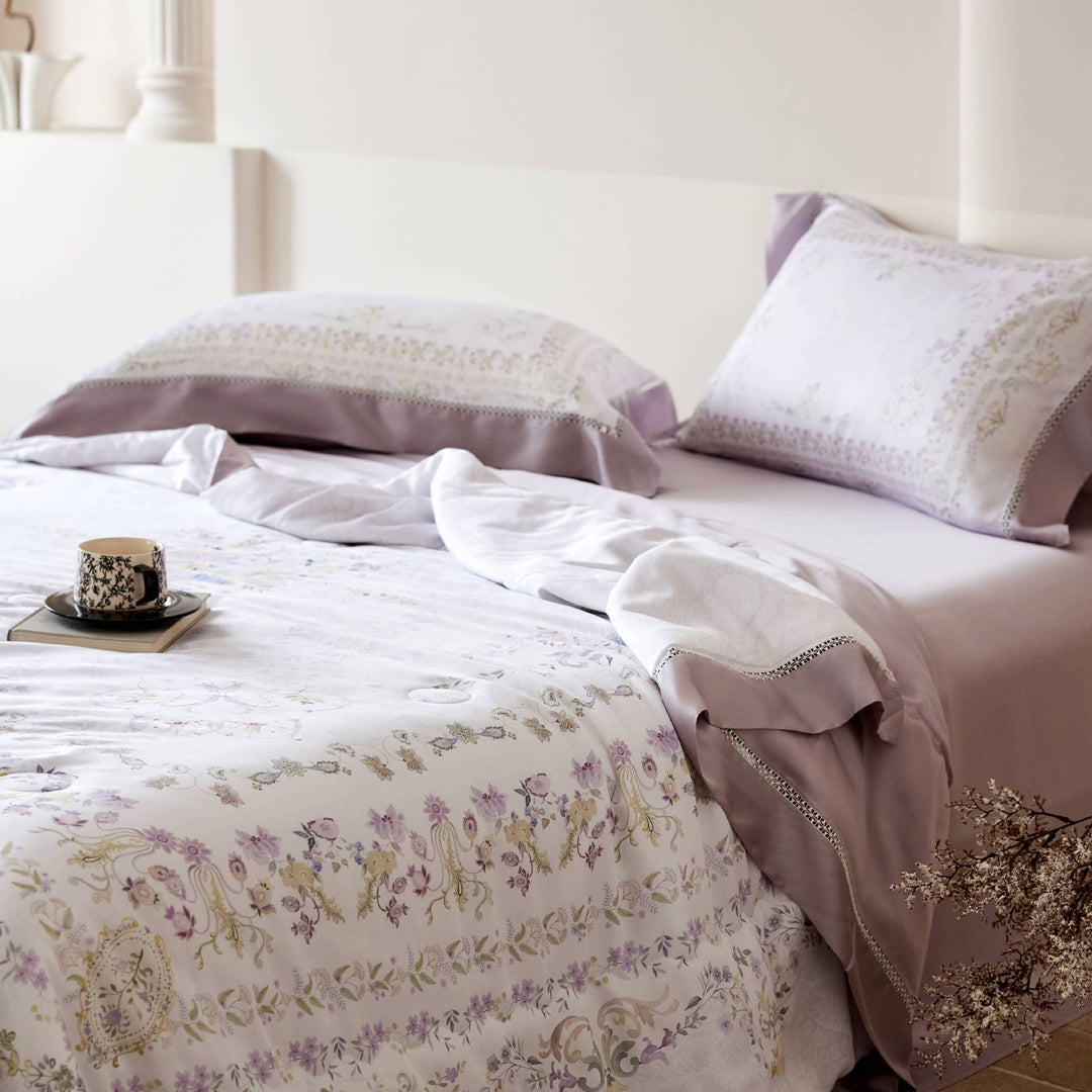Elegant satin bedding set with floral watercolor print and ruffled bed skirt