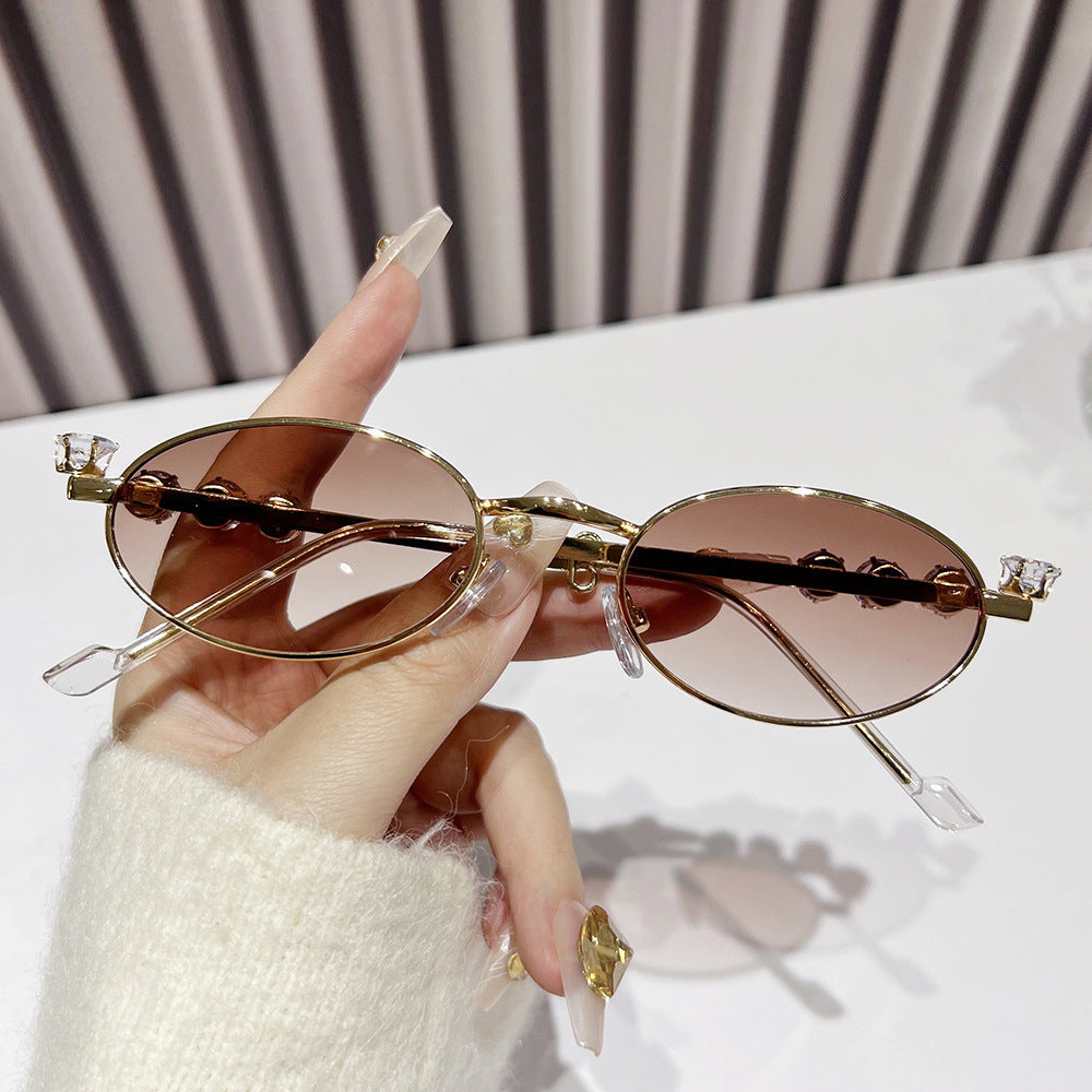 Fashion-Forward Oval Sunglasses with Crystal Accents Stornfield
