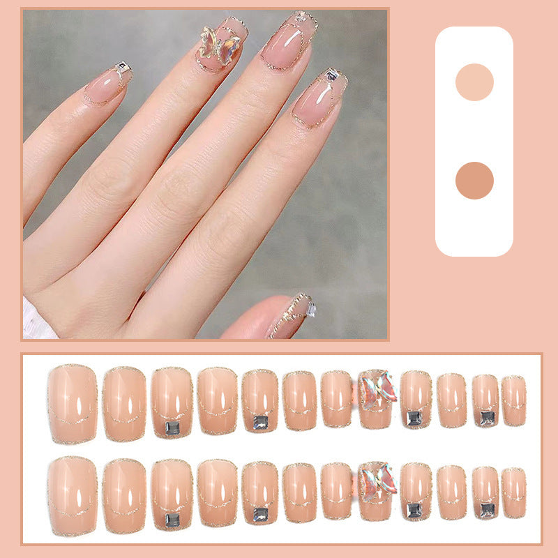 Glamorous artificial nails with delicate rhinestone decorations Stornfield