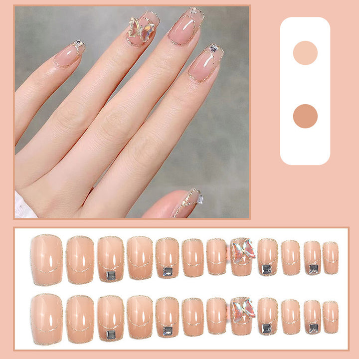 Glamorous artificial nails with delicate rhinestone decorations Stornfield