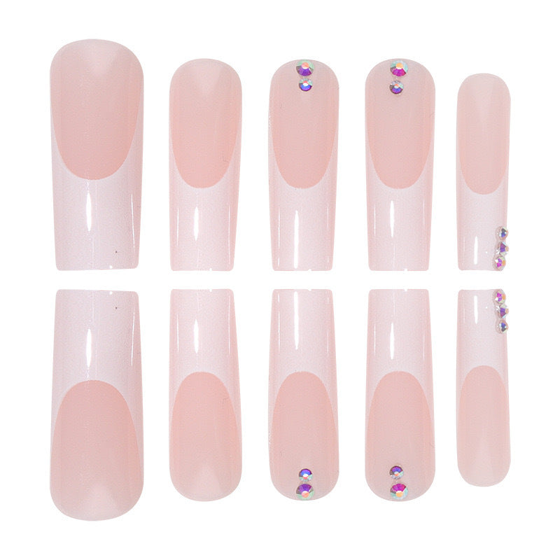 Nail set with elegant French tips and sparkling rhinestone embellishments Stornfield