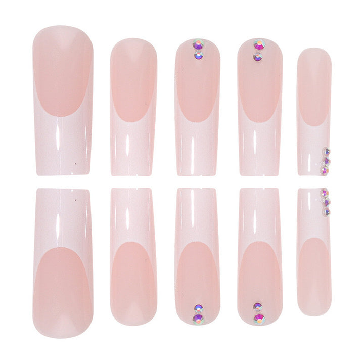 Nail set with elegant French tips and sparkling rhinestone embellishments Stornfield