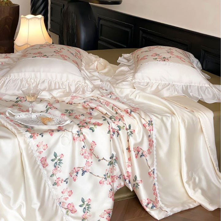 Noble satin bedding set with floral all-over print and ruffled pillow