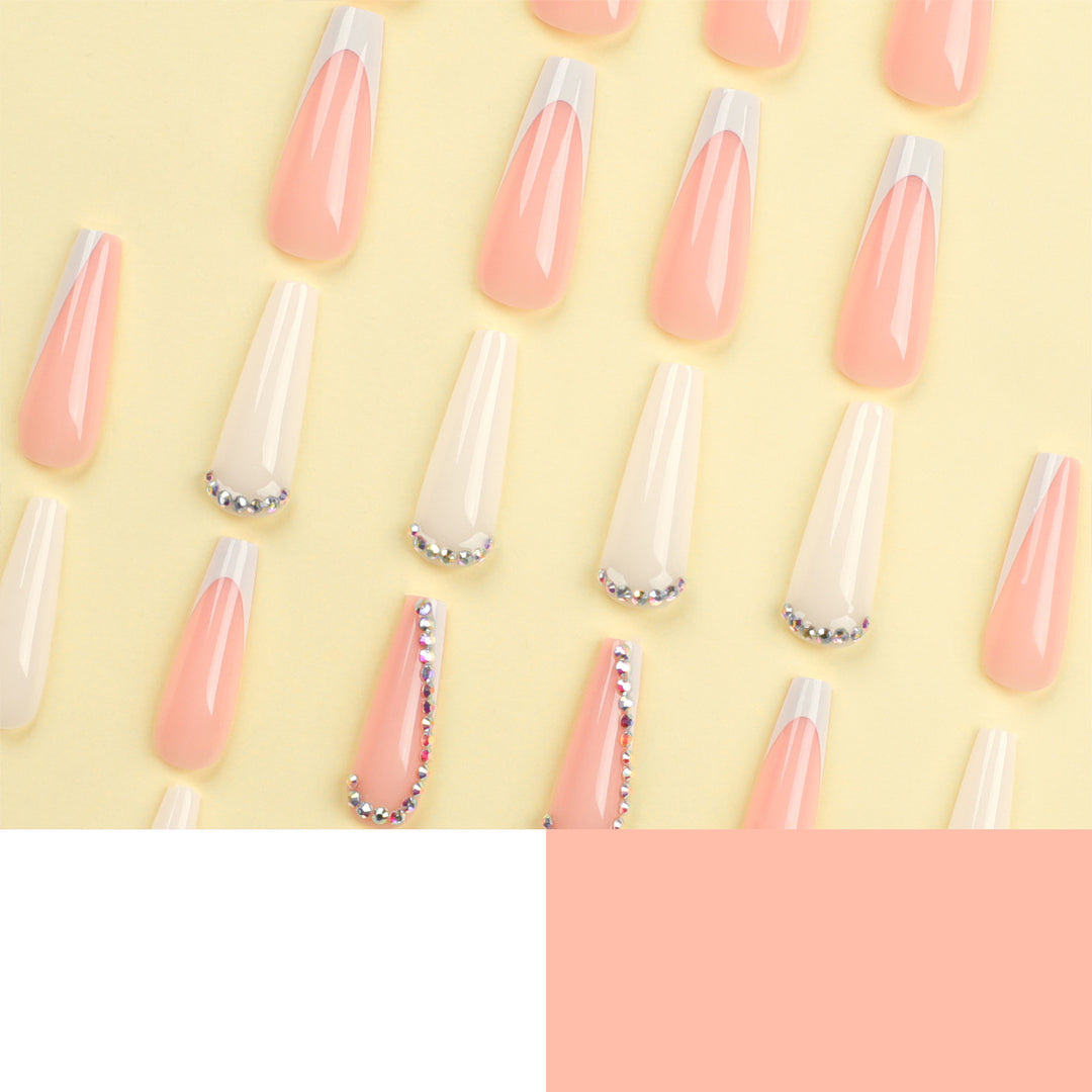 Artful nail extensions with rhinestone embellished accents Stornfield