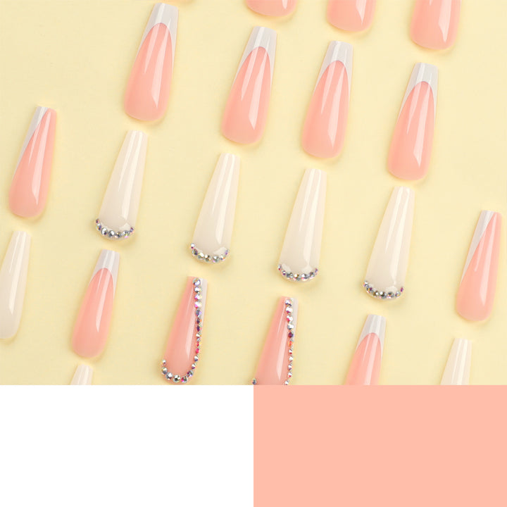 Artful nail extensions with rhinestone embellished accents Stornfield