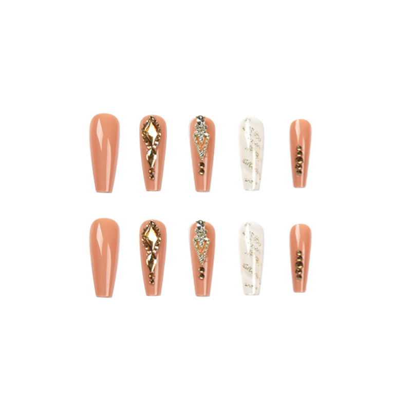Artful nail extensions with glitter embellishments and delicate accents Stornfield