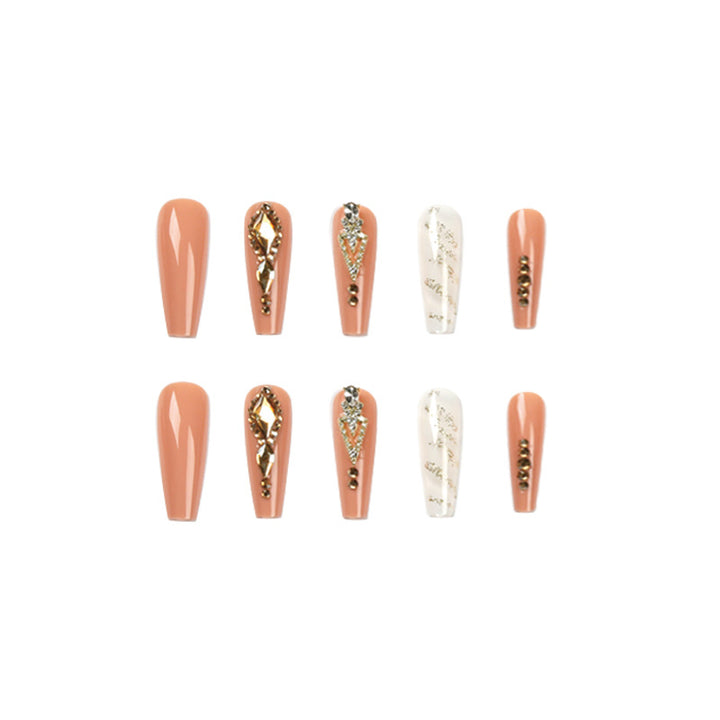 Artful nail extensions with glitter embellishments and delicate accents Stornfield