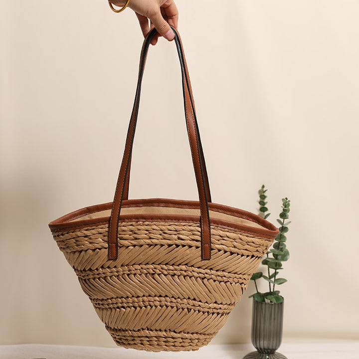 Braided basket bag with innovative leather handles Stornfield