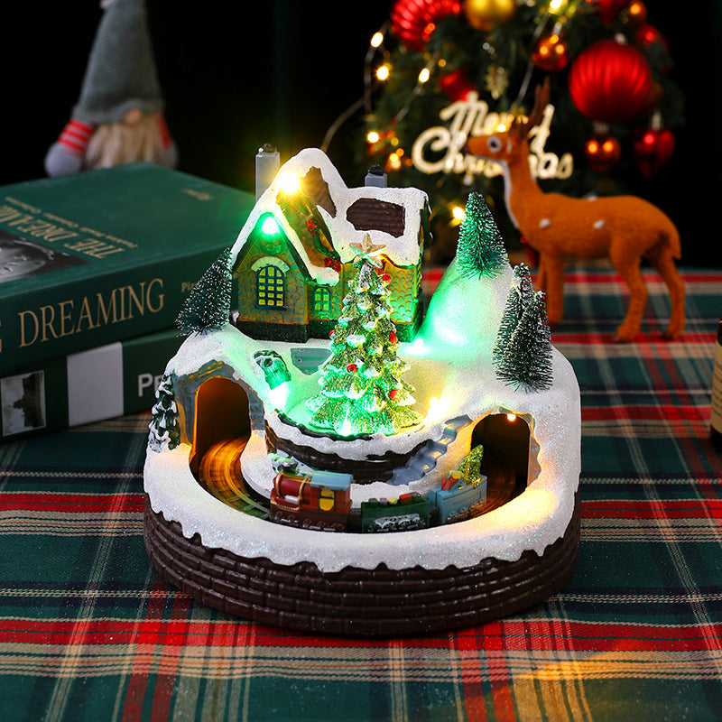 Illuminated Christmas village decoration with moving figures Stornfield