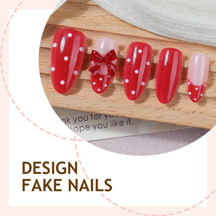 Nail art set with playful bow design and polka dot pattern Stornfield