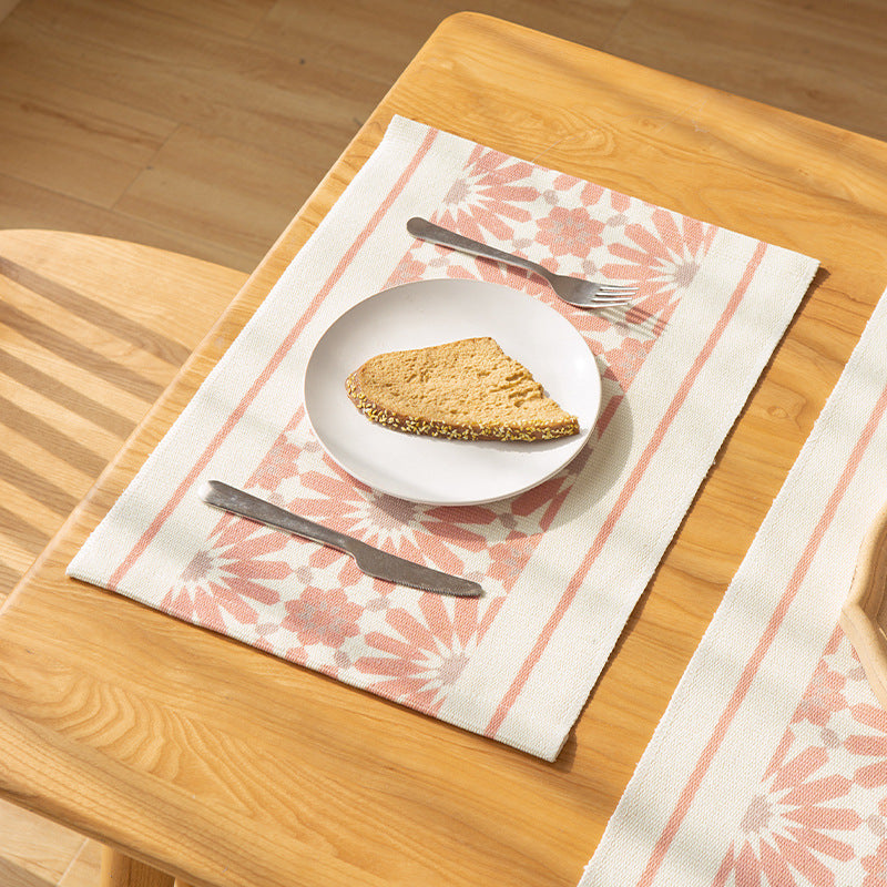 Woven placemat made of cotton blend with geometric diamond trim and fine texture Stornfield