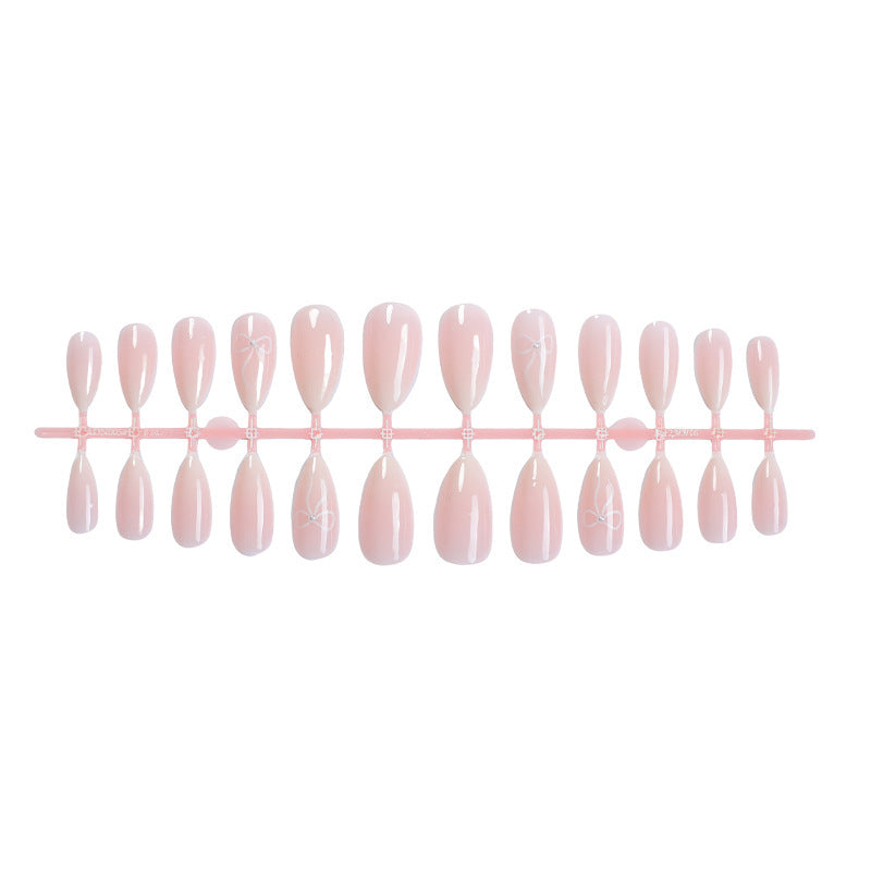 Elegant artificial nails with delicate patterns Stornfield