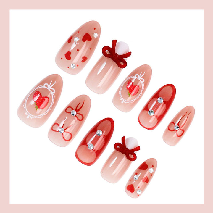 Artificial nail set with cute heart and bow designs Stornfield