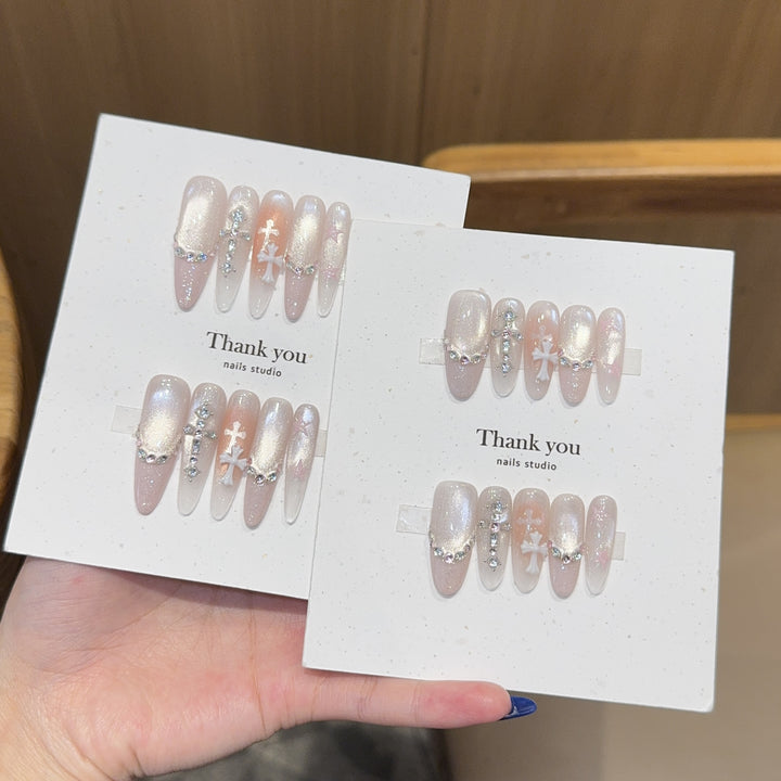 Artificial nails with sparkling rhinestone and glitter effects Stornfield