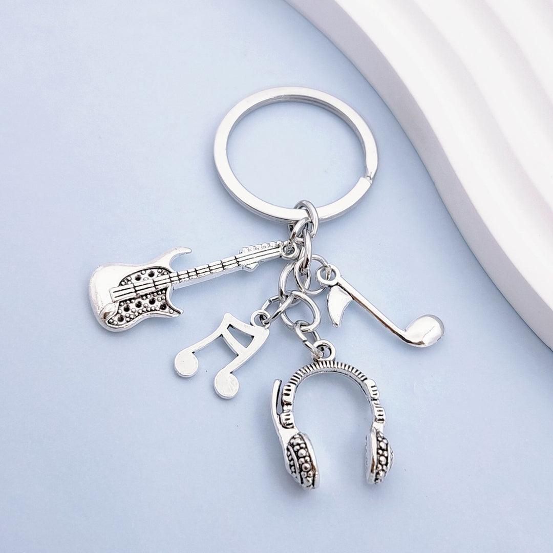 Keychain with musical instruments motifs Stornfield